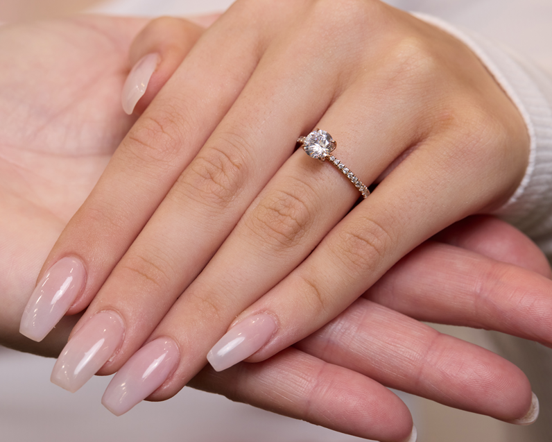 4 Claw Round Brilliant Solitaire Ring with pave band - Yellow Gold