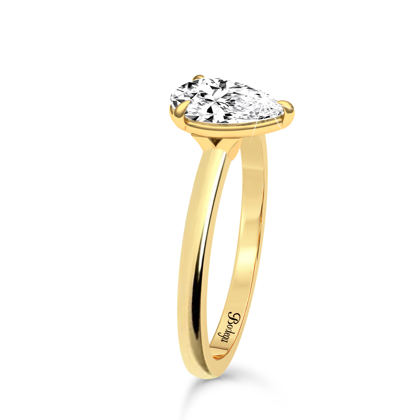 Pear Cut Solitaire Ring in flush setting - Yellow Gold - Bodega