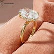Angled profile of a 4ct oval lab-grown diamond solitaire ring in 18kt yellow gold highlighting the hidden halo and elegant cathedral setting.
