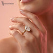 Lifestyle photograph of a handcrafted 4ct oval lab-grown diamond engagement ring in 18kt yellow gold.