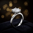 1.5 carat cushion cut diamond solitaire engagement ring in an 18kt white gold 6 claw setting presented in a TJ Diamond ring box