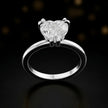 Front view of a 1.5 carat heart cut diamond solitaire engagement ring in an 18kt white gold 6 claw setting by TJ Diamond