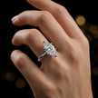 1.5 carat marquise cut diamond solitaire engagement ring in an 18kt white gold 6 claw setting worn on a hand, by TJ Diamond