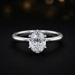 Front view of a 1.5 carat oval cut diamond solitaire engagement ring in an 18kt white gold 6 claw setting by TJ Diamond