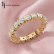 Luxury full eternity diamond wedding band in 18kt yellow gold featuring round brilliant lab-grown diamonds in a contemporary bar setting.