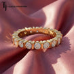 Front view of a full eternity diamond wedding band featuring a bar setting and round brilliant lab-grown diamonds in 18kt yellow gold.