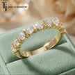 Top view of Bar Half Eternity diamond wedding band in 18kt yellow gold, showing round brilliant diamonds secured between vertical gold bars