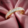 Full eternity diamond wedding band featuring a channel setting in 18kt yellow gold with princess cut lab-grown diamonds.