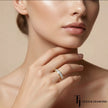 Model wearing Channel Half Eternity diamond wedding band in 18kt yellow gold, close-up lifestyle shot