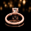 Back view of 4-claw cushion cut engagement ring with hidden halo in 18kt rose gold
