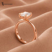1.5 carat cushion cut lab-grown diamond solitaire engagement ring in 18kt rose gold, side profile view