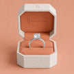 1.5 carat cushion cut lab-grown diamond solitaire engagement ring presented in a TJ Diamond box