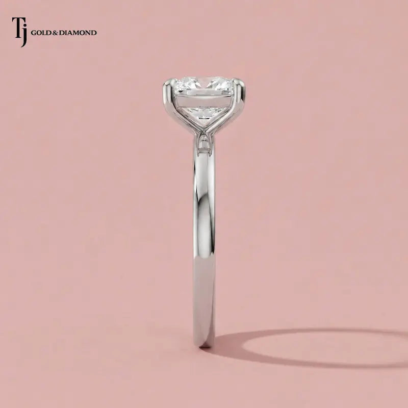 Side profile view of a 1.5 carat cushion cut lab-grown diamond solitaire engagement ring in 18kt white gold