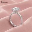 Side view of a 1.5 carat cushion cut lab-grown diamond solitaire engagement ring in 18kt white gold on satin