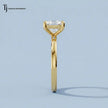 Side profile view of a 1.5 carat cushion cut lab-grown diamond solitaire engagement ring in 18kt yellow gold