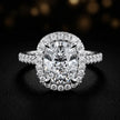 Front view of a cushion cut halo lab-grown diamond engagement ring in 18kt white gold.