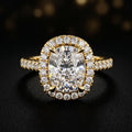 Front view of a cushion cut halo lab-grown diamond engagement ring in 18kt yellow gold.