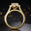 Side view of a cushion cut halo lab-grown diamond engagement ring with diamond-set shoulders in 18kt yellow gold.