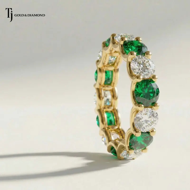 Created Emerald & Diamond Full Eternity Ring – 18kt Yellow Gold