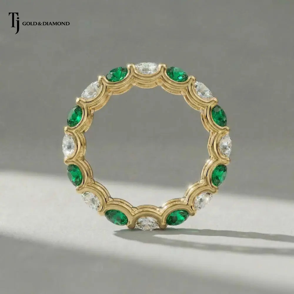 Created Emerald & Diamond Full Eternity Ring – 18kt Yellow Gold