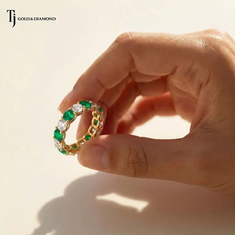 Created Emerald & Diamond Full Eternity Ring – 18kt Yellow Gold