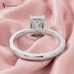 Back view of a 1.5 carat emerald cut lab-grown diamond solitaire engagement ring in 18kt white gold with a 4-claw setting