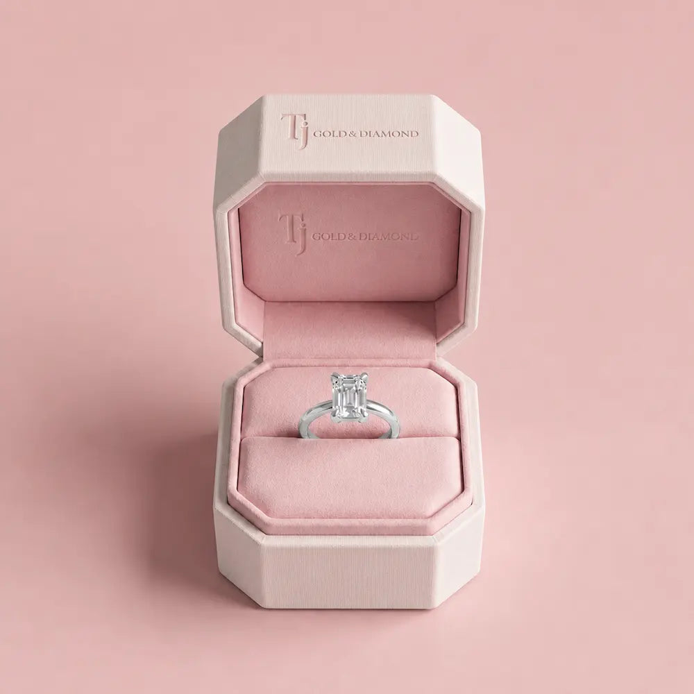 1.5 carat emerald cut lab-grown diamond solitaire engagement ring in 18kt white gold in a TJ Diamond box
