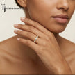 Model wearing Claw Fish Tail Half Eternity diamond wedding band in 18kt yellow gold, close-up lifestyle shot