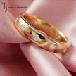 Flush setting full eternity diamond wedding band in 18kt yellow gold with round brilliant lab-grown diamonds.