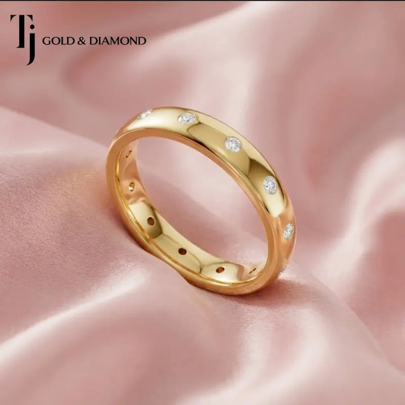 Full eternity diamond wedding band featuring a modern flush setting in 18kt yellow gold with round brilliant lab-grown diamonds.