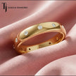 Luxury flush setting full eternity diamond wedding band crafted in 18kt yellow gold with round brilliant lab-grown diamonds.