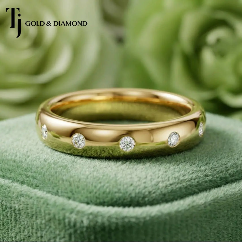Front view of Flush Half Eternity diamond wedding band in 18kt yellow gold, round brilliant diamonds set flush into smooth band
