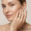 Model wearing Flush Half Eternity diamond wedding band in 18kt yellow gold, close-up lifestyle shot