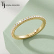 Top view of French Pavé Half Eternity diamond wedding band in 18kt yellow gold, showing round brilliant diamonds in seamless pavé setting