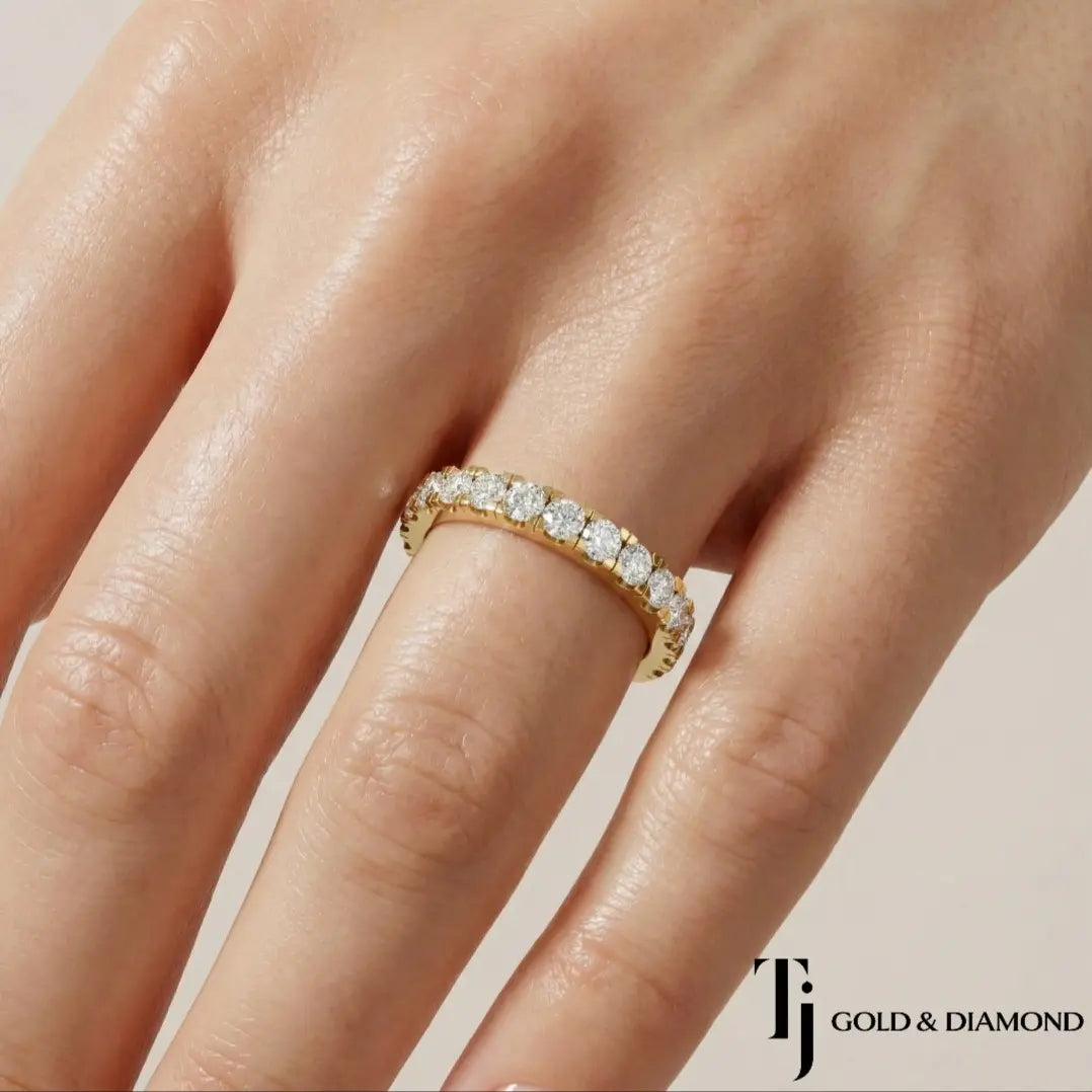 French Pavé Half Eternity diamond wedding band worn on hand, 18kt yellow gold with round brilliant lab-grown diamonds