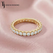 Full eternity diamond wedding band featuring a French pavé setting in 18kt yellow gold with round brilliant lab-grown diamonds.