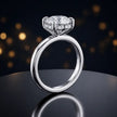 Front view of 4-claw heart cut engagement ring with hidden halo in 18kt white gold