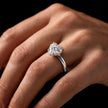 4-claw heart cut engagement ring with hidden halo in 18kt white gold, worn on hand