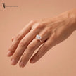  1.5 carat heart cut lab-grown diamond solitaire engagement ring in 18kt rose gold worn on hand