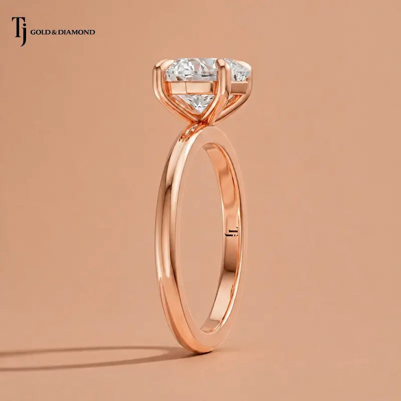 Side profile view of a 1.5 carat heart cut lab-grown diamond solitaire engagement ring in 18kt rose gold