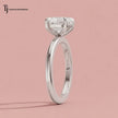 Side profile view of a 1.5 carat heart cut lab-grown diamond solitaire engagement ring in 18kt white gold