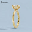 Side profile view of a 1.5 carat heart cut lab-grown diamond solitaire engagement ring in 18kt yellow gold