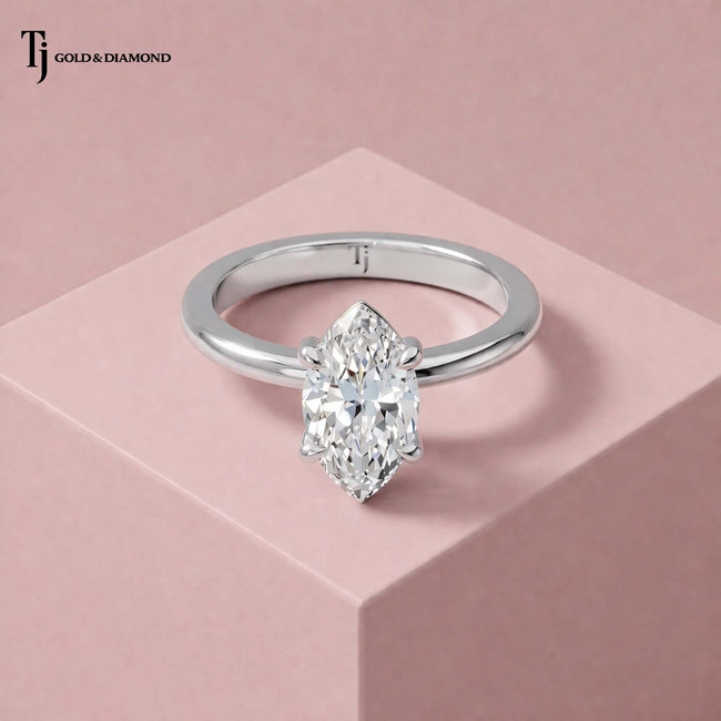 4-Claw Marquise Cut Solitaire Diamond Ring - White Gold ( Platinum)
