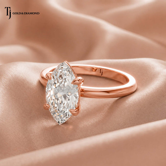4-Claw Marquise Cut Solitaire Diamond Ring - Rose Gold