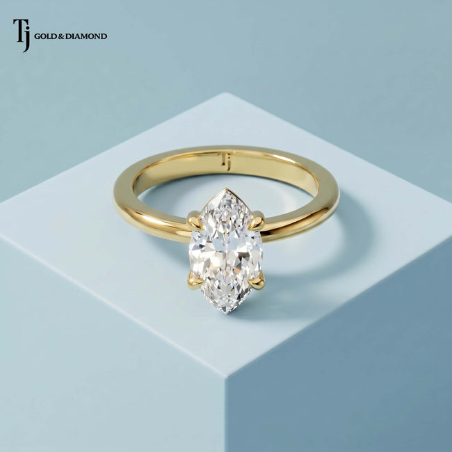 4-Claw Marquise Cut Solitaire Diamond Ring - Yellow Gold