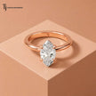 Front view of a 1.5 carat marquise cut lab-grown diamond solitaire engagement ring in 18kt rose gold with a 4-claw setting