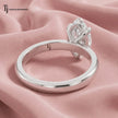 Back view of a 1.5 carat marquise cut lab-grown diamond solitaire engagement ring in 18kt white gold with a 4-claw setting