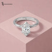 Front view of a 1.5 carat marquise cut lab-grown diamond solitaire engagement ring in 18kt white gold with a 4-claw setting