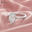 Side view of a 1.5 carat marquise cut lab-grown diamond solitaire engagement ring in 18kt white gold on satin