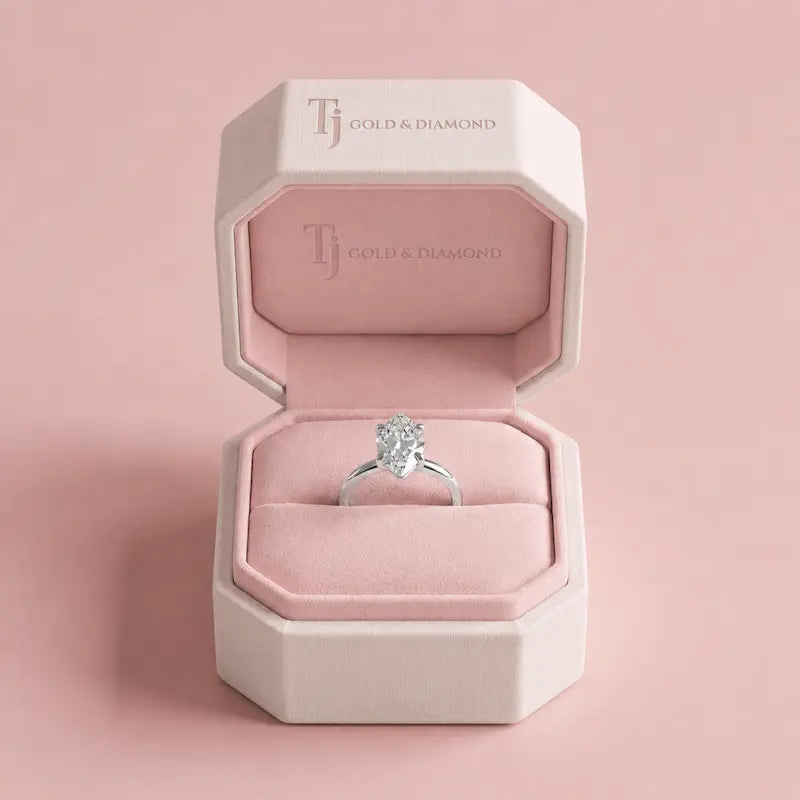 1.5 carat marquise cut lab-grown diamond solitaire engagement ring in 18kt white gold in a TJ Diamond box